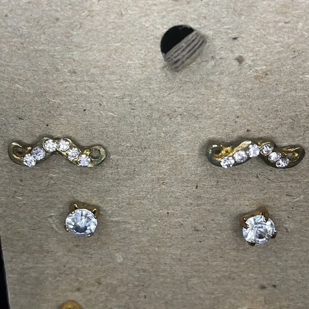 Three sets of earrings